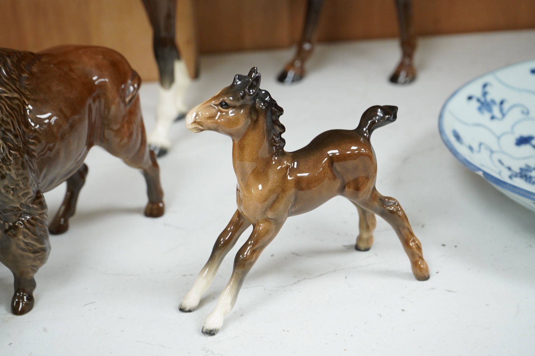 A Beswick large gloss glazed horse, a bison and a shire foal (3) tallest 29cm.